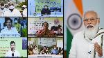 PM Modi transfers about Rs 19,500 crore to over 9.75 crore farmers under PM-KISAN PM Modi transfers about Rs 19,500 crore to over 9.75 crore farmers under PM-KISAN